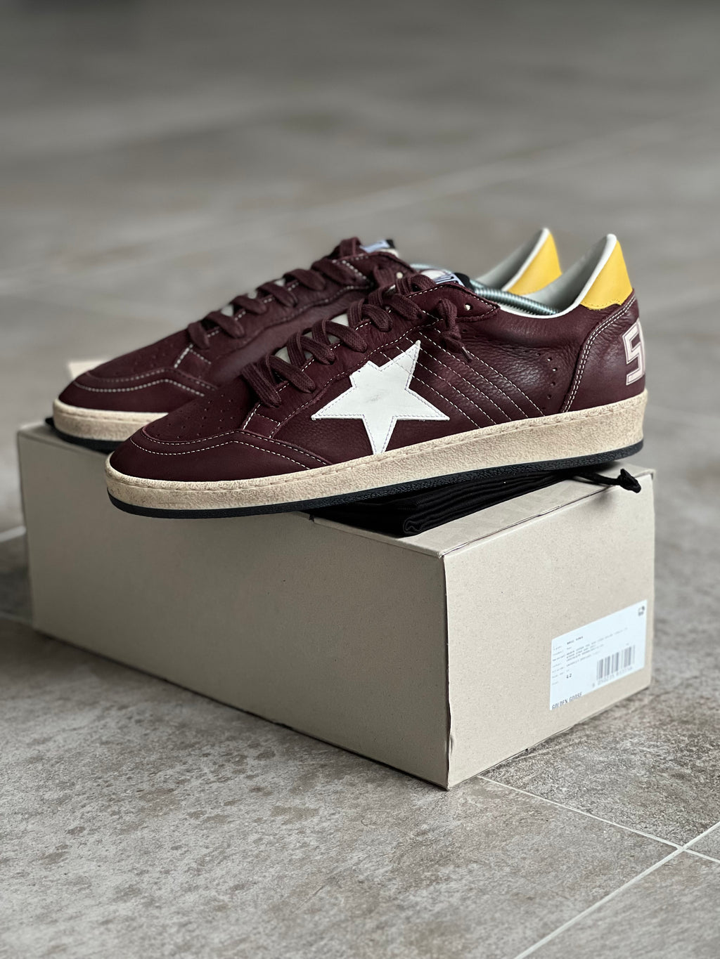 Various sizes | Golden Goose Ball Star Burgundy Man
